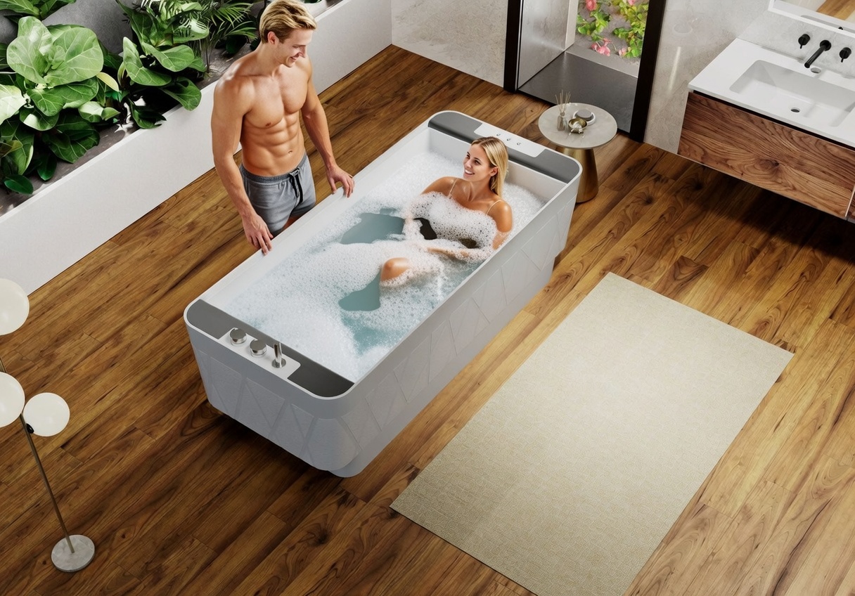 Baignoire balnéo îlot droite KINÉDO GLAMOUR 180x80 Solid surface effet débordement d'eau système AIR EQUILIBRE tête bain à droite